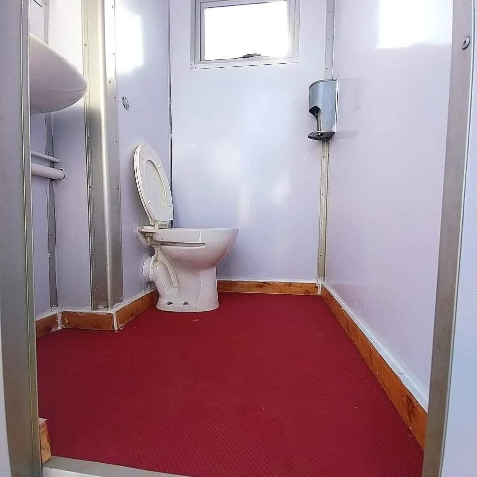 Portable washroom interior clean and sanitised in Nairobi
